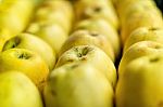 Big Stack Of Yellow Apples Stock Photo