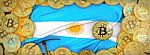 Bitcoins Gold Around Argentina  Flag And Pickaxe On The Left.3d Stock Photo