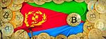 Bitcoins Gold Around Eritrea  Flag And Pickaxe On The Left.3d Il Stock Photo