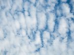 Blue Sky Background With A Tiny Clouds Stock Photo