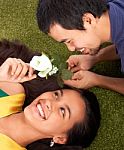 Boy Gives Rose To His Lover Stock Photo