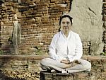 Buddhist Woman Meditating Stock Photo