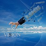 Business hand with vision text Stock Photo