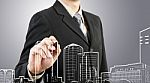 Business Man Drawing A Cityscape  Stock Photo
