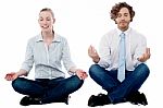 Business People Practicing Meditation Stock Photo