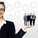 Business People Standing On Palm Stock Photo