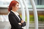 Business Woman Smiling Arms Crossed Stock Photo