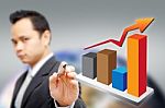 Businessman Pointing At Chart Stock Photo
