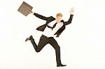 Businessman Running With Briefcase Stock Photo