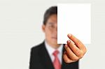Businessman Showing Blank Paper Stock Photo