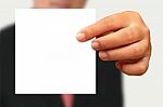 Businessman Showing Blank Paper Stock Photo