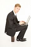 Businessman Sitting With Laptop