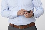 Businessman With A Smartphone Stock Photo