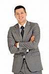 Businessman With Arms Crossed Stock Photo