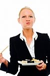 Businesswoman Eating Sushi Stock Photo