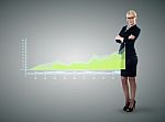 Businesswoman Looking At Digital Graph Stock Photo