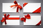 Card With Red Ribbons Bows Stock Photo