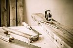 Carpenter Tools,hammer,meter,pencil,shavings, And Chisel Over Wo Stock Photo