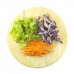Carrot Cabbage And Lettuce Salad Ingredient On Chopping Board Stock Photo