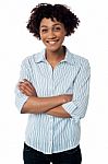 Causual Smiling Woman With Folded Arms Stock Photo