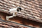 Cctv On Old Roof Stock Photo