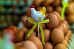 Chicken Figurine On Eggs Stock Photo