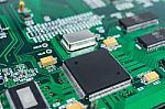 Circuit Board With Electronic Components Background Stock Photo