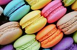 Close Up Colourful Tasty Sweet Macaroons Dessert On Black Backgr Stock Photo