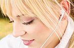 Close Up Of A Woman With Headphones Stock Photo