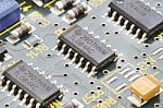 Close Up Of Electronic Circuit Board With Processor Stock Photo