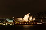 Close Up Opera House In Sydney At Night, Reflection On Harbour View.australia Stock Photo