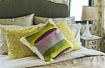 Colorful Pillows On Bed Stock Photo