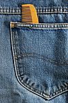 Comb In Jeans Pocket Stock Photo
