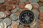 Compass On Coins Stock Photo