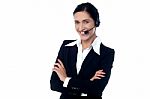 Confident Smiling Female Customer Support Staff Stock Photo