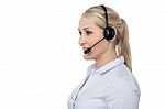 Confident Smiling Female Customer Support Staff Stock Photo