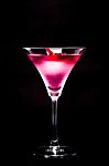 Cosmopolitan Cocktail With Rose In Top Of A Black Background Stock Photo