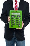 Cropped Image Of Business Guy Holding Calculator Stock Photo