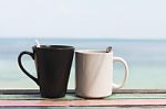 Cuple Of Coffee Cups In The Morning On Retro Terrace Facing Seas Stock Photo