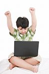 Cute Little Boy With Laptop Stock Photo