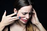 Desperate Young Woman Touching Her Face. Concept Of Abuse And De Stock Photo