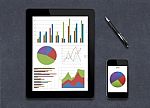 Digital Tablet Showing Charts And Diagram On Screen, Stock Photo
