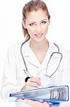 Doctor With Papers And Stethoscope Stock Photo