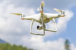 Drone Flying Above Mountains Stock Photo