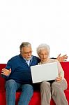 Elderly Couple With Laptop