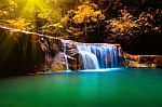 Erawan Waterfall In Thailand In Deep Forest With Sunbeam Stock Photo