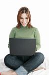 Excited Girl With Laptop Stock Photo