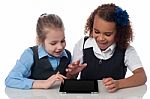 Excited Kids Using Tablet Pc Stock Photo
