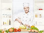 Female Chef Preparing Meal Stock Photo