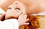 Female Getting A Head Massage Stock Photo